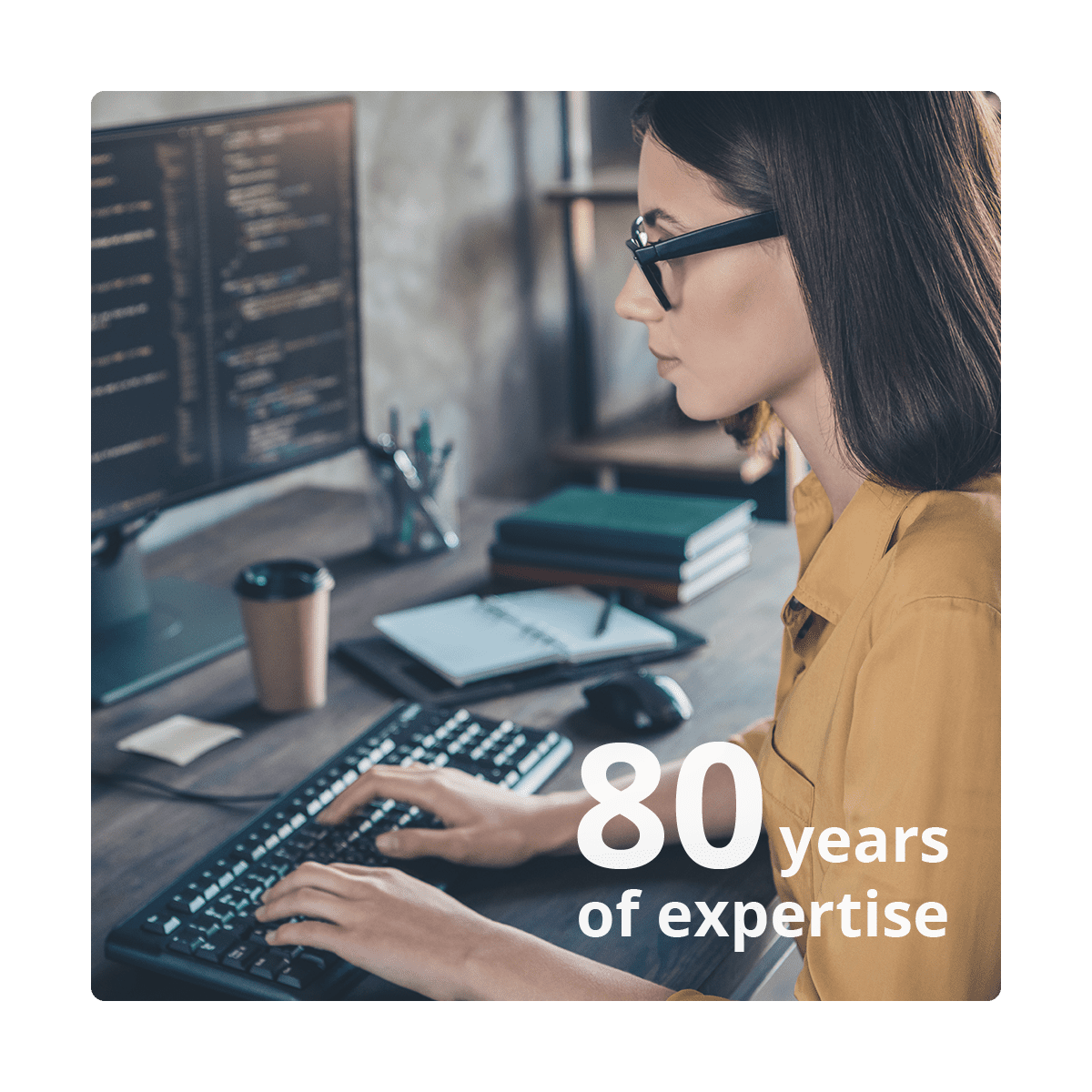 woman typing, and the text "80 years of expertise"